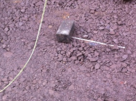 Electricity cables just under the surface are going to make it difficult to get new paving stones flush.